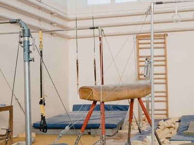 Functional training area with various fitness equipment items.