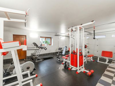 Minimalist gym interior with natural light and clean lines.